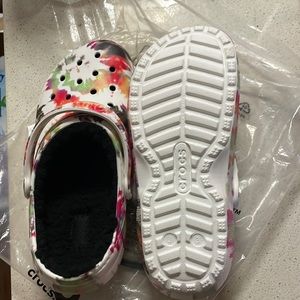 New and never used classic lined CROCS